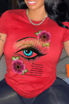 T-shirt con scollo a V patchwork stampato occhi rossi