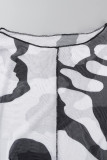 Dos piezas de manga larga con cuello en O transparente de patchwork con estampado sexy en blanco y negro