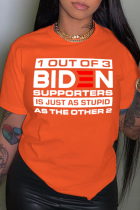 Orangefarbene, lässige Street-Print-Patchwork-T-Shirts mit O-Ausschnitt und Buchstaben