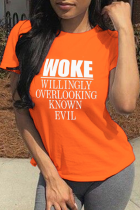 Оранжевые повседневные футболки с круглым вырезом в стиле пэчворк с уличным принтом