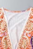 Robes de jupe une étape rose sexy imprimé patchwork fente col en V