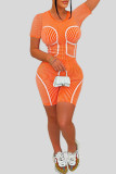 Barboteuse slim orange sexy à rayures et imprimé patchwork à col rond