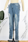 Jeans de mezclilla de cintura alta con retazos ahuecados de vendaje rasgado sólido de calle sexy azul claro