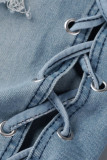 Jeans in denim a vita alta con patchwork strappati e fasciatura strappata azzurra sexy da strada