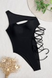 Bandage solide noir sexy évidé maillots de bain dos nu (avec rembourrages)