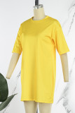 Vestidos de t-shirt com decote em O e casual street sólido amarelo