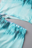 Ljusblått sexigt tryck ihåligt lapptäcke slits sned krage raka klänningar