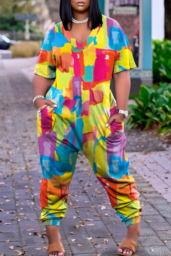 Gele Harlan-jumpsuits met patchwork en V-hals en straatprint