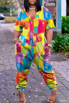 Gele Harlan-jumpsuits met patchwork en V-hals en straatprint