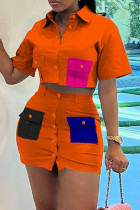 Colletto della camicia con bottoni patchwork solidi casual arancioni manica corta due pezzi