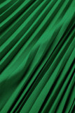 Grüner, lässiger Punktdruck, ausgehöhlte Patchwork-O-Ausschnitt-Faltenkleider