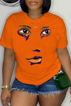 T-shirts décontractés orange à col rond et patchwork imprimé rue