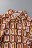 Gelbes Patchwork-Hemdkleid mit Umlegekragen und lässigem Druck