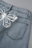 Lichtblauwe casual vlinderprint patchwork normale spijkerbroek met hoge taille