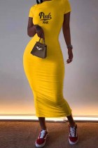 Vestidos de falda de un paso con cuello en O estampado informal amarillo