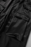 Pantalones casuales de color liso de cintura alta con bolsillo de retazos lisos en la calle negro