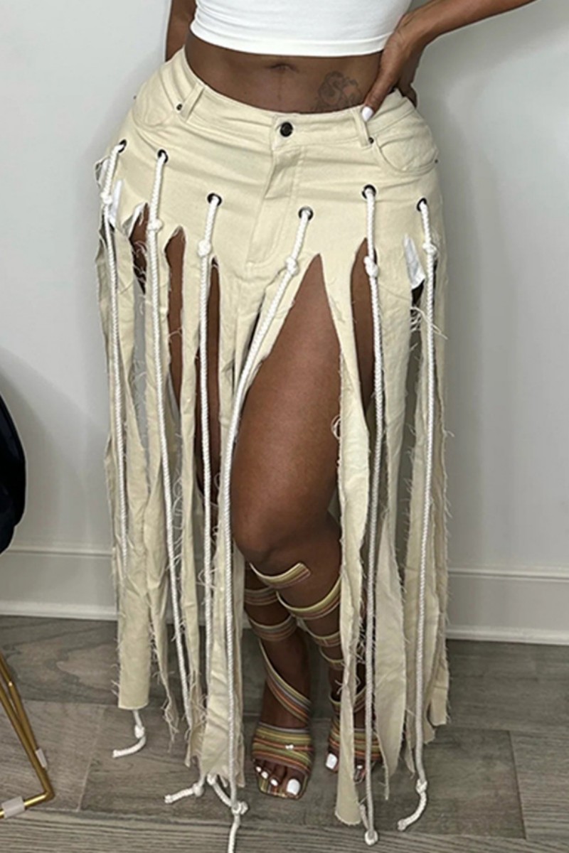 

Apricot Casual Solid Tassel Patchwork Regular Mid Waist Conventional Solid Color Skirts
