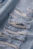 Pantaloncini di jeans regolari a vita alta con patchwork strappati con nappe casual blu