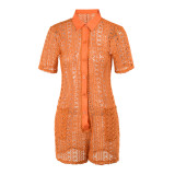 Tangerine Red Sexy Solid Hollow Out Patchwork Buckle Turndown Collar Straight Rompers