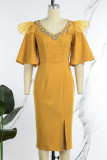 Желтые повседневные однотонные платья-юбки в стиле пэчворк с V-образным вырезом и разрезом