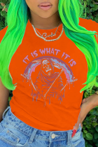 T-shirt con scollo a O con patchwork di teschio con stampa vintage arancione Street