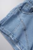 Pantaloncini di jeans a vita alta con patchwork tinta unita color azzurro cielo