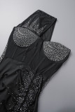 Schwarze sexy Party Solide durchsichtige Falten Hot Drill Solid Color One Shoulder Wrapped Rock Kleider