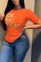 Оранжевые повседневные повседневные футболки с принтом в стиле пэчворк и буквенным o-образным вырезом