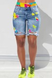 Short en jean skinny taille moyenne asymétrique imprimé patchwork déchiré bleu