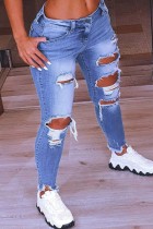Голубые повседневные однотонные рваные джинсы больших размеров