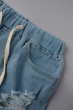 Pantaloncini di jeans a vita alta patchwork strappati con stampa stradale blu scuro