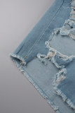 Pantaloncini di jeans a vita alta patchwork strappati con stampa stradale azzurra