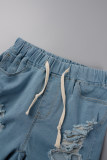 Pantaloncini di jeans a vita alta patchwork strappati con stampa stradale azzurra