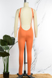 Oranje Sexy Casual Effen Uitgehold Ruglooze V-hals Skinny Jumpsuits
