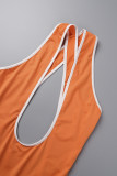 Orange Sexy Casual Solid Hollowed Out Backless V Neck Skinny Jumpsuits