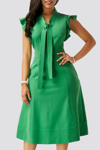 Зеленые элегантные однотонные платья в стиле пэчворк с воланами и круглым вырезом