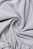 Robes de jupe une étape grises sexy solides évidées à col en V