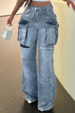 Hellblaue, lockere Street-Jeans mit Patchwork-Tasche und hoher Taille und allmählichem Wechsel
