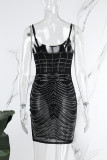 Svart sexigt lapptäcke Hot Drilling Genomskinlig rygglös spaghettiband omslagna kjolklänningar