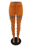 Pantaloni a vita alta skinny strappati sexy alla moda arancione