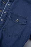 Macacões jeans skinny liso azul escuro vazado frênulo gola redonda manga curta