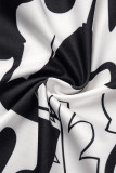 Macacões soltos pretos estampados patchwork com babados e zíper decote em V
