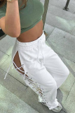 Weiße Street Solid ausgehöhlte Patchwork-Kreuzträger, lockere, einfarbige Hose mit weitem Bein