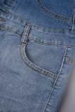 Die Cowboy-blauen, lässigen, allmählich wechselnden Patchwork-Jeansröcke mit hoher Taille und schmaler Passform