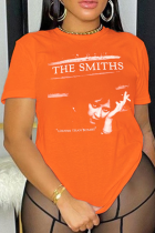 T-shirts décontractés à col rond et patchwork imprimé quotidien orange