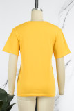 Camisetas con cuello en O de patchwork con estampado de simplicidad de calle amarillo