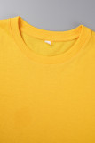 Gelbe, lässige Patchwork-T-Shirts mit O-Ausschnitt und täglichem Aufdruck