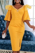 Vestidos amarelos casuais lisos patchwork com fenda e decote em V com decote em V vestidos saia