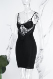 Vestidos de falda envueltos con correa de espagueti sin espalda transparente de patchwork sexy negro