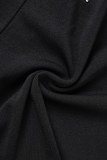 Черный элегантный однотонный узкий комбинезон с кисточками в стиле пэчворк, открытой спиной и без бретелек